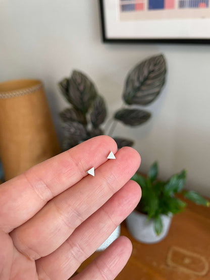 Minimal silver triangle studs